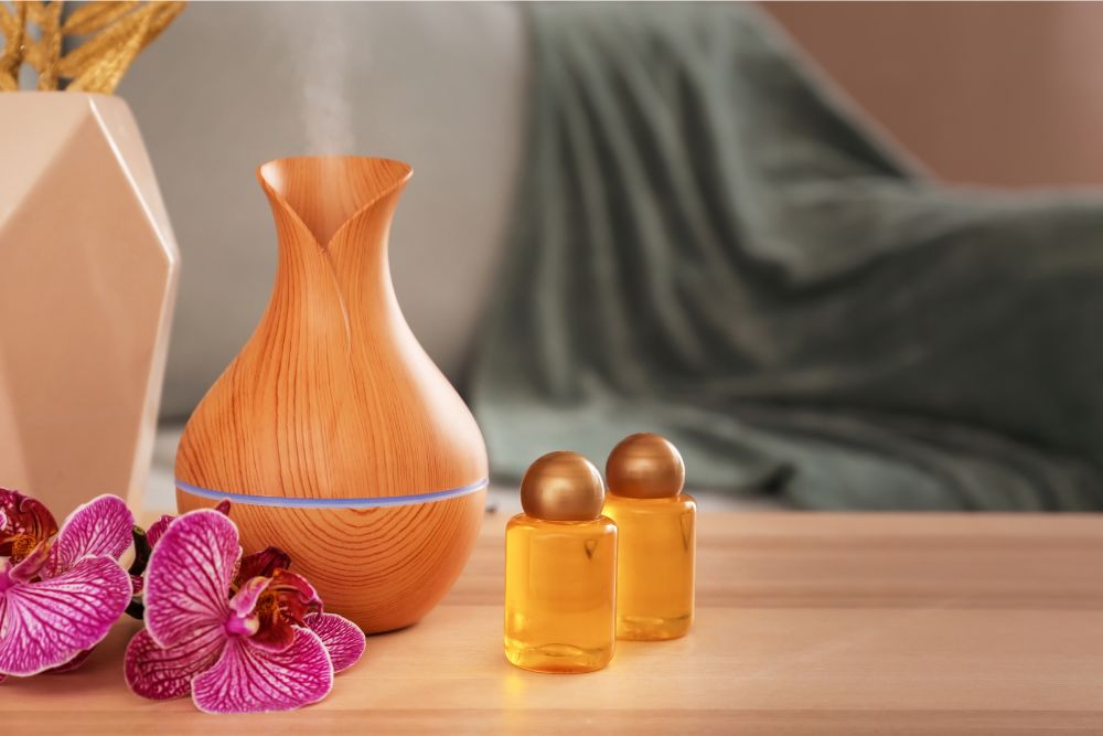 Aromadiffuser met een bloem en oliën – symbool van ontspanning met aromatherapie